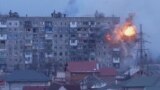 'Who Will Bring Back Our Children?' Russian Tanks Shell Residential Buildings In Mariupol screen grab