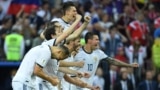 RUSSIA -- Russia's players celebrate their victory at the end of the Russia 2018 World Cup round of 16 football match between Spain and Russia at the Luzhniki Stadium in Moscow, July 1, 2018