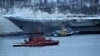 RUSSIA -- Smoke rises from Russia's only aircraft carrier, the Admiral Kuznetsov, in Murmansk, December 12, 2019